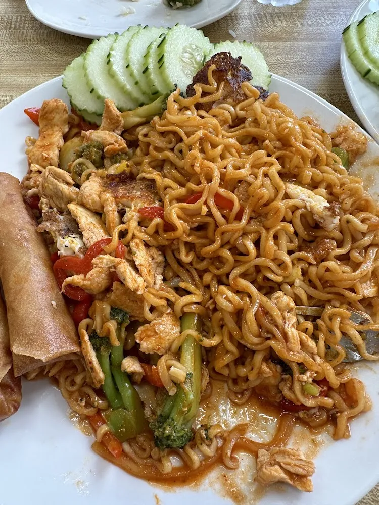 Spicy Noodles with Chicken and Fried Egg